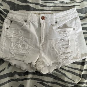 White destressed shorts